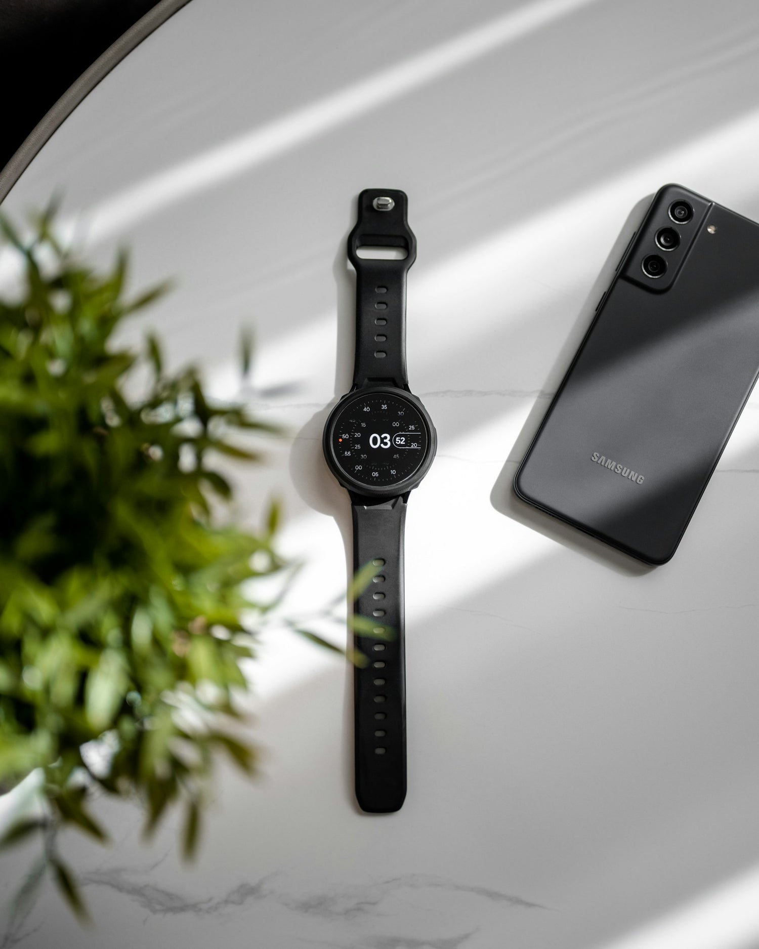 Samsung watch and mobile phone